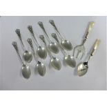 Set of eight Sterling silver teaspoons and a mother of pearl handled pickle fork and spoon (10)
