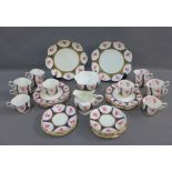 Aynsley twelve place floral pattern teaset with blue and gilt reserves, comprising twelve cups,