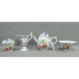 Chinese blue and white tea wares to include a teapot, milk jug, sugar bowl, and another bowl with