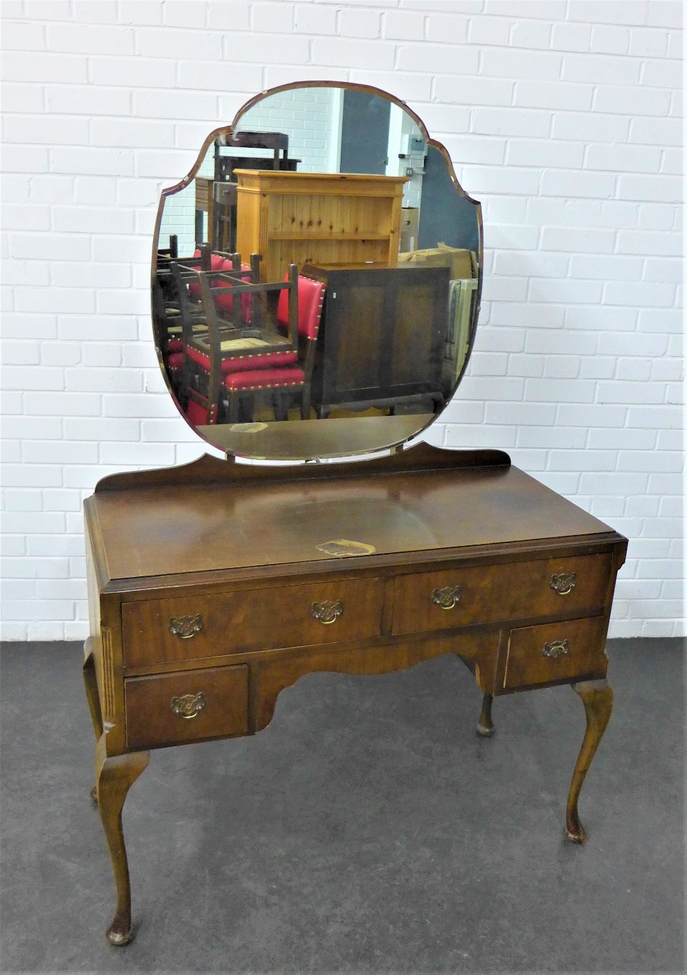 Mahogany dressing table with two long drawers above two short, on cabriole legs, 165 x 105cm