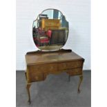 Mahogany dressing table with two long drawers above two short, on cabriole legs, 165 x 105cm
