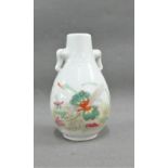 Miniature twin handled vase painted with flowers and insects, 11cm high