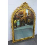 Large rococo style giltwood and ebonised wall leaning mirror, 230 x 148cm