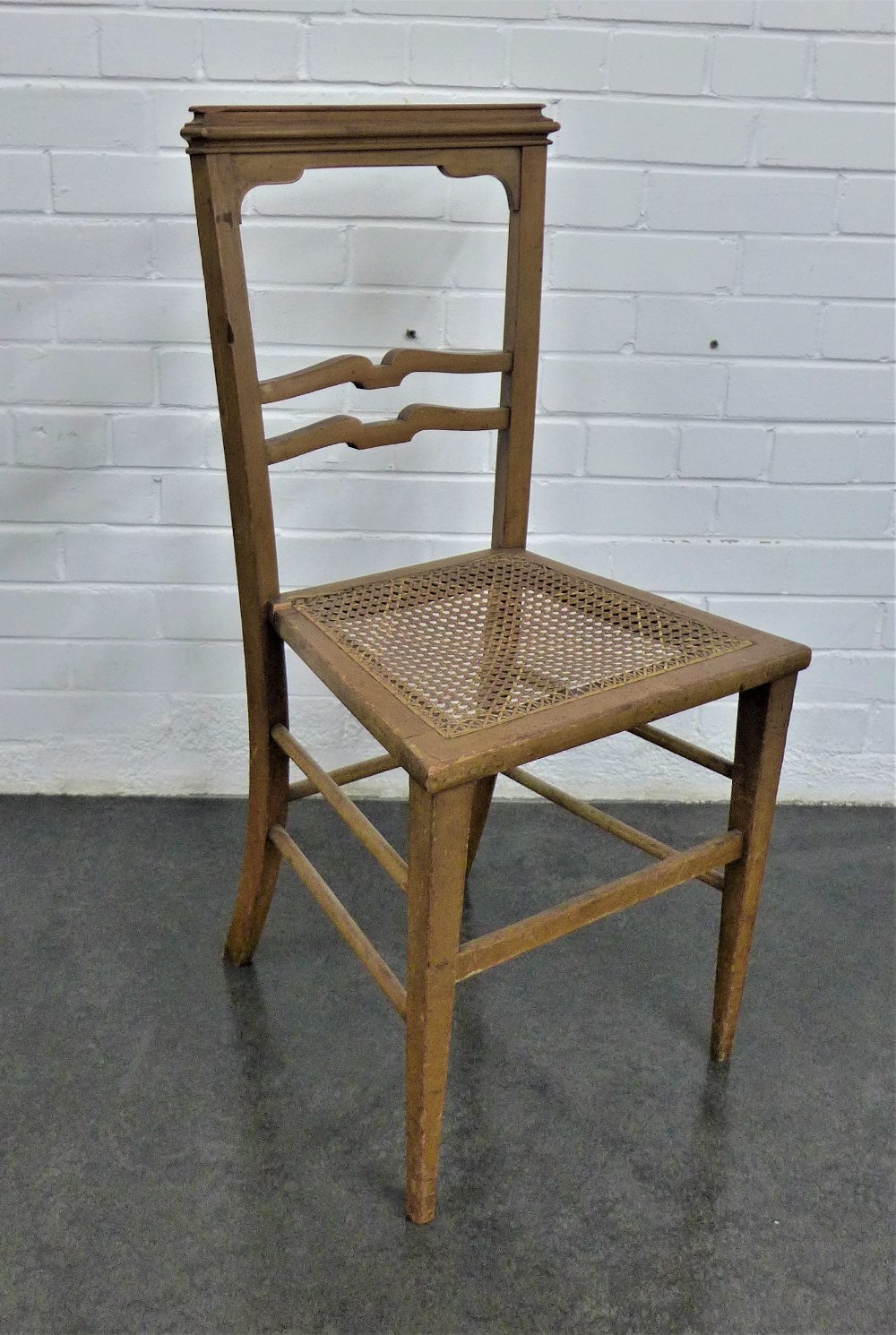 An oak chair with canework seat