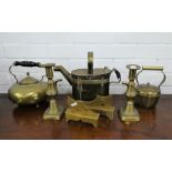 A selection of brass wares, to include a pair of candlesticks, a pair of shoe bookends, teapot,