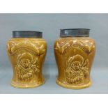 Pair of 19th Century brown glazed pottery snuff jars with metal lids, 22cm high, (2)