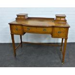 Edwardian satinwood desk, the top with brown leather skivver and two superstructure drawers, the