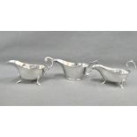 Three silver sauce boats to include Walker & Hall, Sheffield 1929, John Round & Son Sheffield 1927