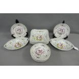 Continental porcelain dessert service with bird and butterfly pattern, comprising two oval serving