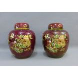 Pair of Carlton Ware Rouge Royale ginger vases with covers, painted with pagoda pattern, yellow