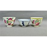 A collection of three Chinese tea bowls to include a blue and white bowl painted with figures and