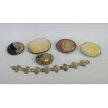 A collection of hardstone jewellery to include a shamrock bracelet and five brooches (6)