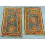 Two Turkish rugs with green field and red border, largest 75 x 120cm, (2)