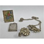 Victorian white metal foliate engraved locket / pendant, white metal framed tapestry brooch with