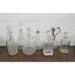 A collection of eight various decanters with stoppers, (8)