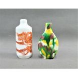 Two Chinese snuff bottles, one with a Dragon pattern the other with a mottled glaze, tallest 9cm, (