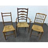 Lancashire style ladderback open armchair with rush seat together with two others (3) 103 x 60, (3)