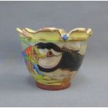 Maureen Minchin (b.1954) studio pottery bowl with wavy rim and painted with a Puffin, impressed seal
