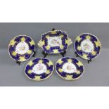 English porcelain dessert service with hand painted floral sprays within cobalt reserves with gilt