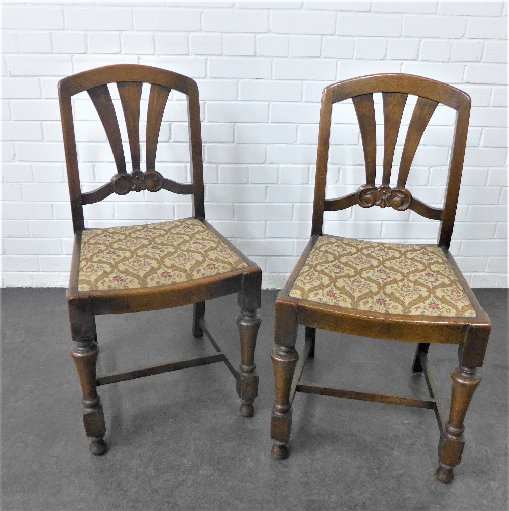 Pair of oak Art Deco side chairs with floral upholstered seats, 97 x 46cm, (2)