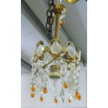 Small chandelier with clear and amber coloured glass droplets