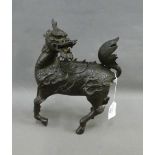 Bronze Kylin with a small detachable cover on its back, 28cm high