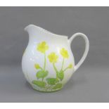Jessica Herriot of Bute floral patterned jug, signed to the base, 16cm high