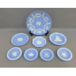 Collection of Wedgwood blue and white Jasperware plates and trinket dishes, largest 23cm