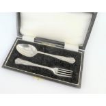 Cased Birmingham silver Christening set comprising a spoon and fork,
