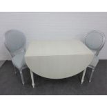 Drop leaf table, together with two silver giltwood chairs with upholstered backs and seats, 75 x