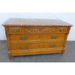 Oak chest with red marbled hardstone top over three short and two long drawers, 81 x 138cm