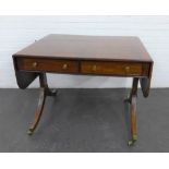 19th century mahogany sofa table, the rectangular top above two frieze drawers, the splayed legs