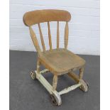 Child's pine chair on wheels, 54 x 41cm