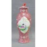 Chinese Famille Rose baluster vase and cover, the floral ground with hand figural panels, size