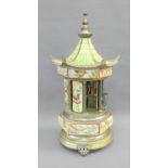 Vintage musical Pagoda cigarette dispenser with ceramic panels, 39cm high