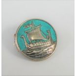 Alexander Ritchie green enamel Viking boat brooch, stamped AR Iona, 2.5cm