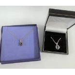 9 carat white gold necklace with blue topaz pendant together with 9 carat gold gemset pendant on