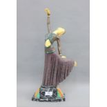 Contemporary Art Deco style dancing figure on a coloured hardstone base, size overall 50cm high