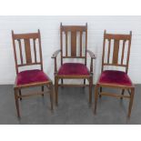 Early 20th century oak open armchair with upholstered slip in seat together with a pair of oak