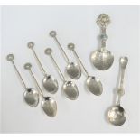 Set of six Chinese unmarked white metal spoons together with two others (8)