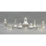 Victorian silver pepper pot, Chester 1895, 10cm high together with six various silver pepper pots, a