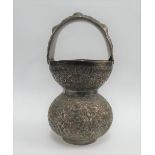 Indian silver vase with a looped handle and floral pattern, 218 grams, 16cm high