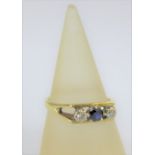 18 carat gold diamond and sapphire three stone dress ring, London 1978, UK ring size T