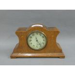 Art Nouveau oak cased mantle clock, the enamel dial with Arabic numerals and subsidiary seconds