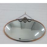 Early 20th century copper framed oval wall mirror, 46 x 76cm