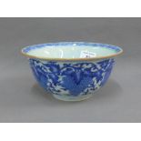 Chinese blue and white bowl with fruit and vine pattern, brown edged top rim and circular foot