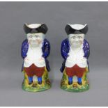 Pair of Staffordshire Toby jugs, 24cm high (2)