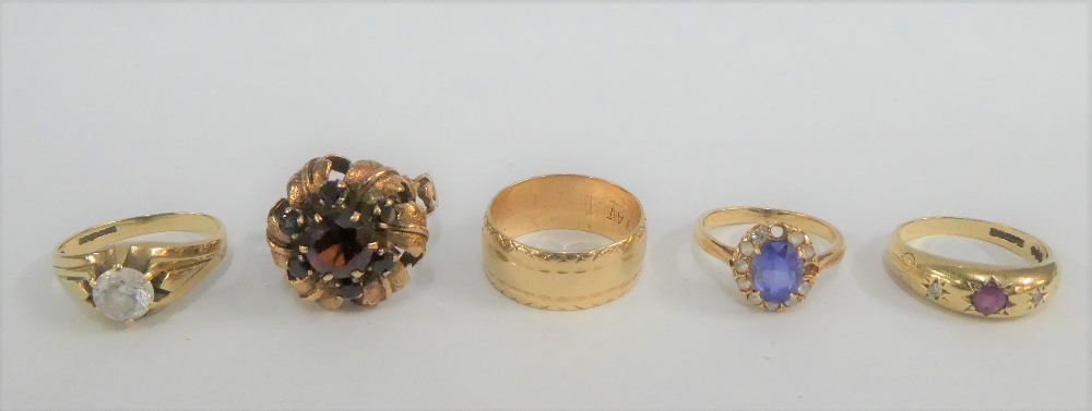 Four 9 carat gold gemset dress rings together with a 9 carat gold wedding band (5)