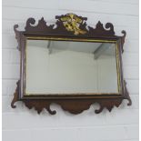 Georgian style mahogany wall mirror with giltwood bird motif over a rectangular plate, 58 x 52cm