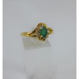 18 carat gold emerald and diamond dress ring, UK ring size U